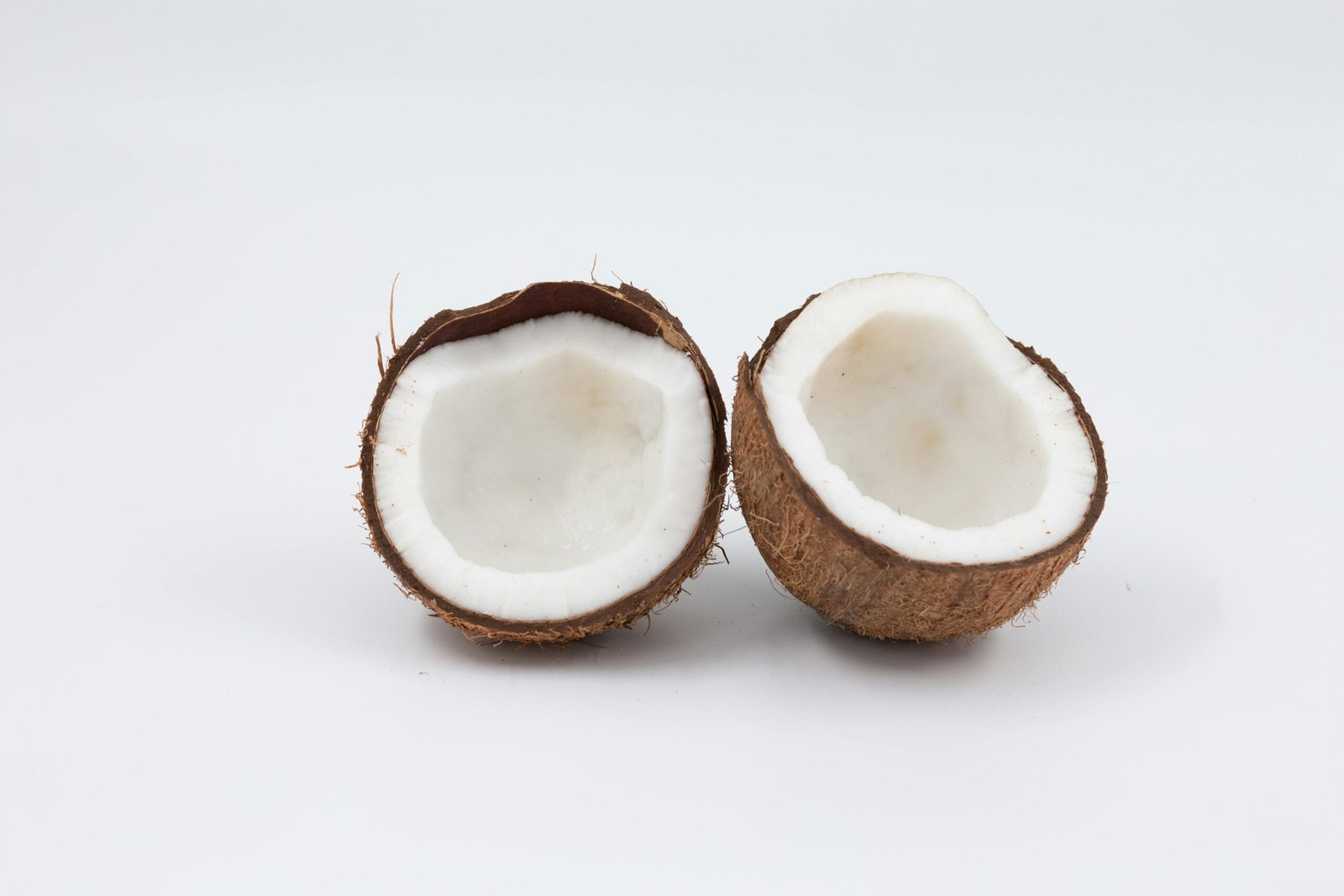 High-resolution image of an open coconut showcasing its natural texture and fresh appearance.
